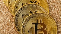 Mesmo em queda, Bitcoin mantém força com apoio institucional - Imagem: Reprodução - Edição: Tribuna Financeira