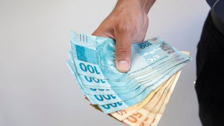 Novo salário mínimo de R$ 1.921,72 entra em vigor? Entenda o que muda no seu bolso - Imagem: Reprodução - Edição: Tribuna Financeira